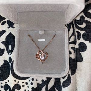 Rose colored heart necklace